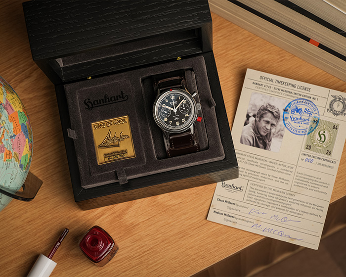 Hanhart Steve McQueen limited edition watch displayed in collector box beside special numbered plaque and identification card